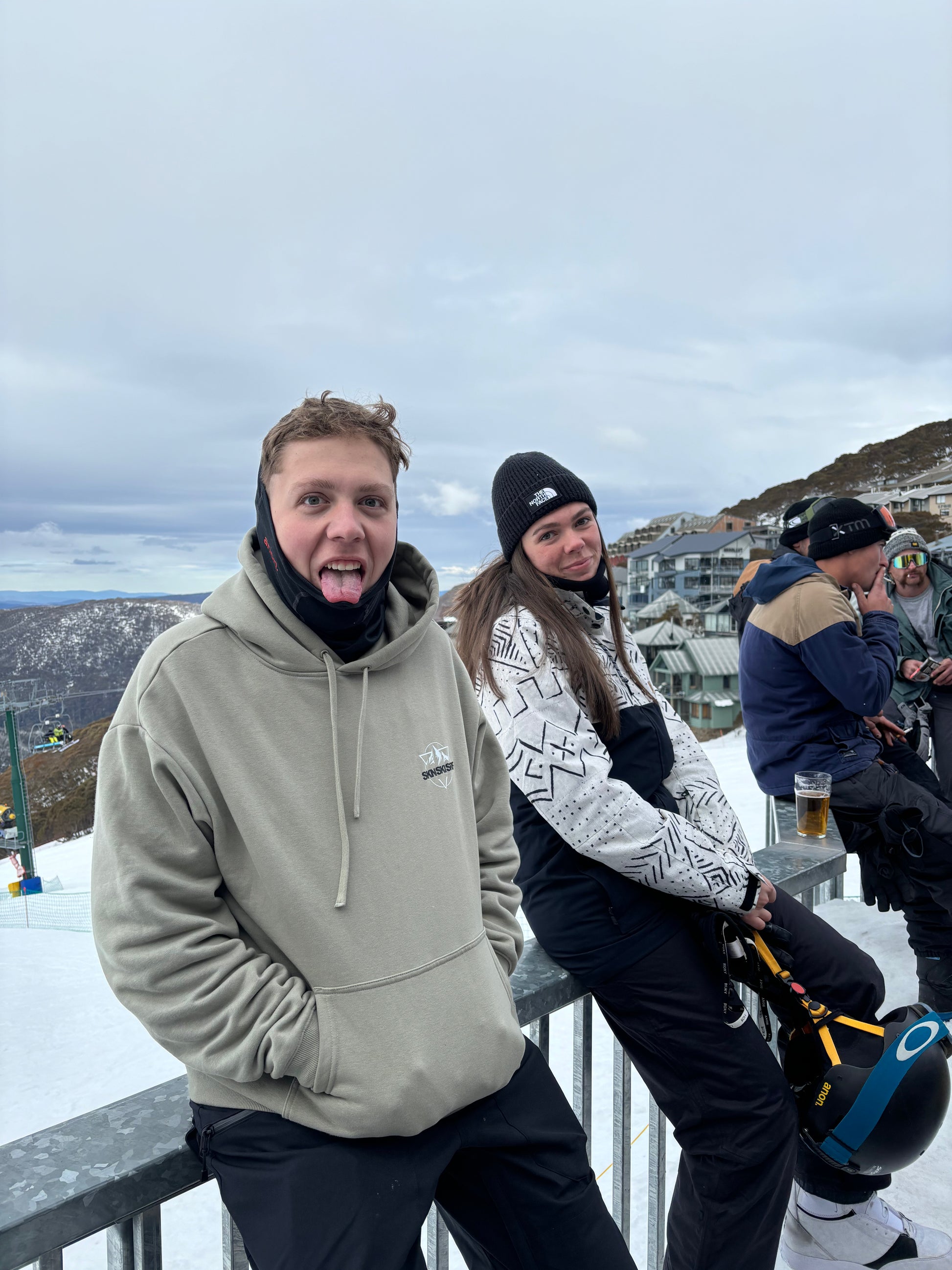 Sitting at a bar on Mountain hotham after a day of Snow Boarding with Skin Ski and Surf