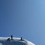 People at the top of Mouth Hotham in amazing snow on a Blue Bird Day
