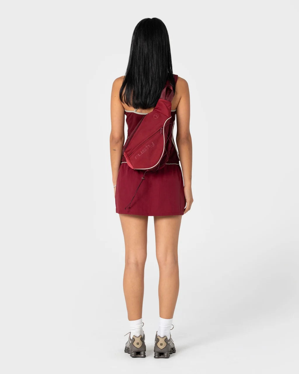 FREE RUN NYLON SLING BACKPACK