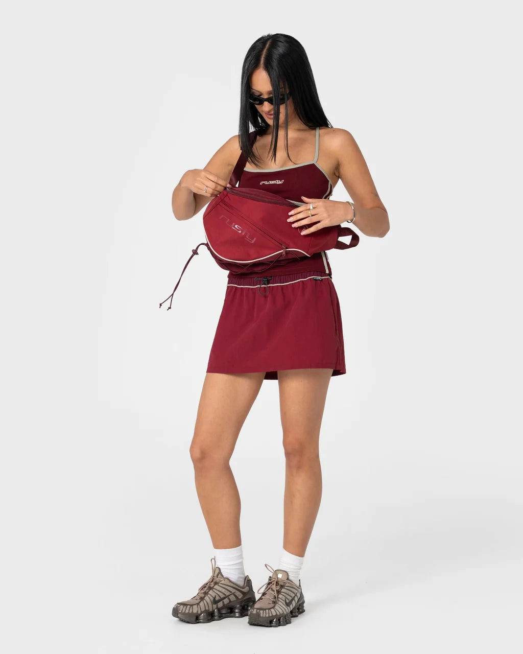 FREE RUN NYLON SLING BACKPACK